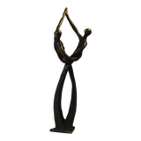 Tanned sculpture, "dancing couple". Signed M.N