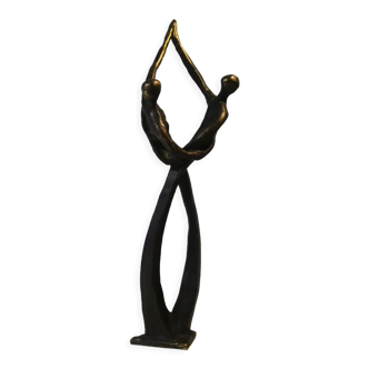 Tanned sculpture, "dancing couple". Signed M.N