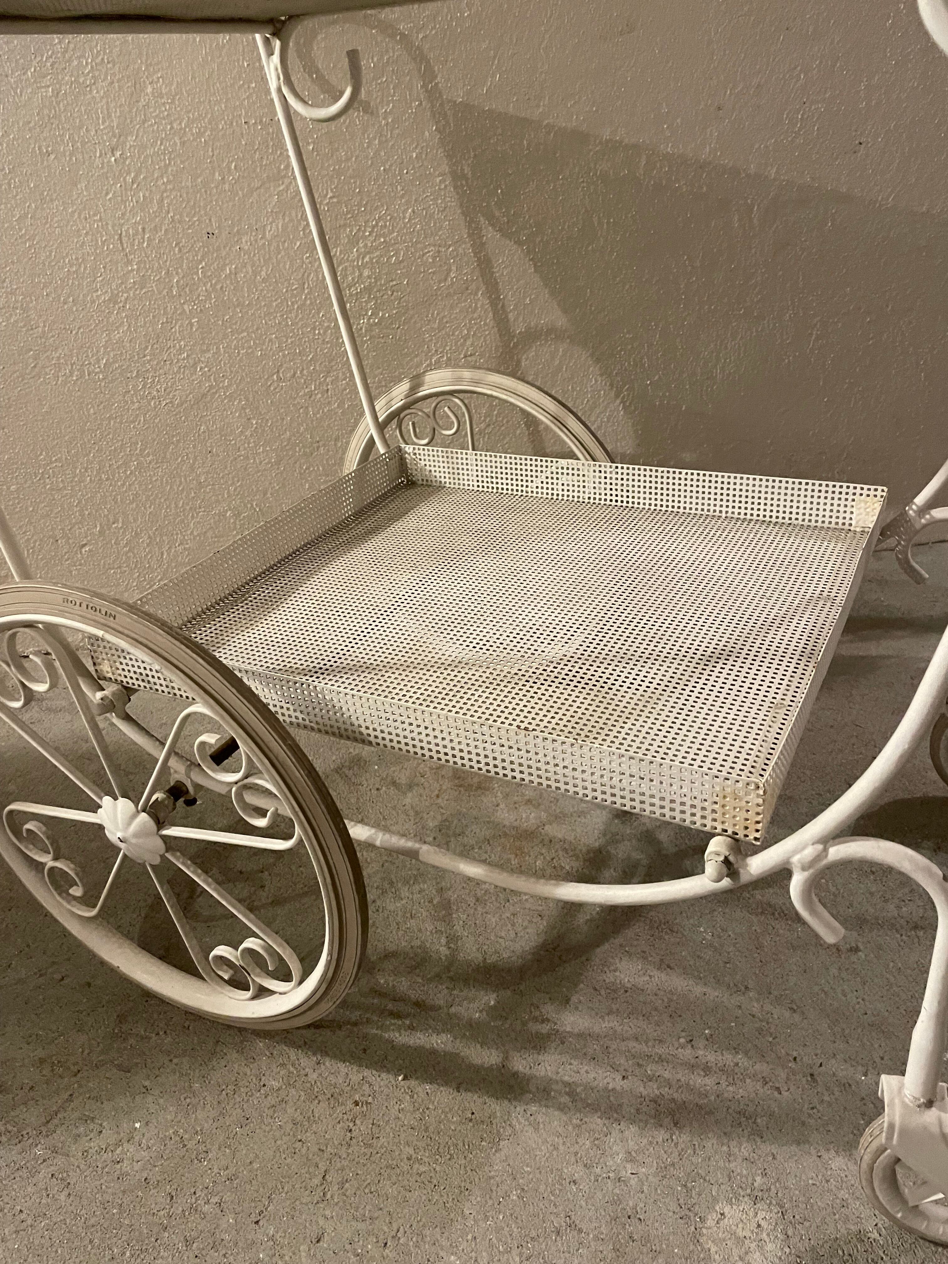 White perforated metal trolley