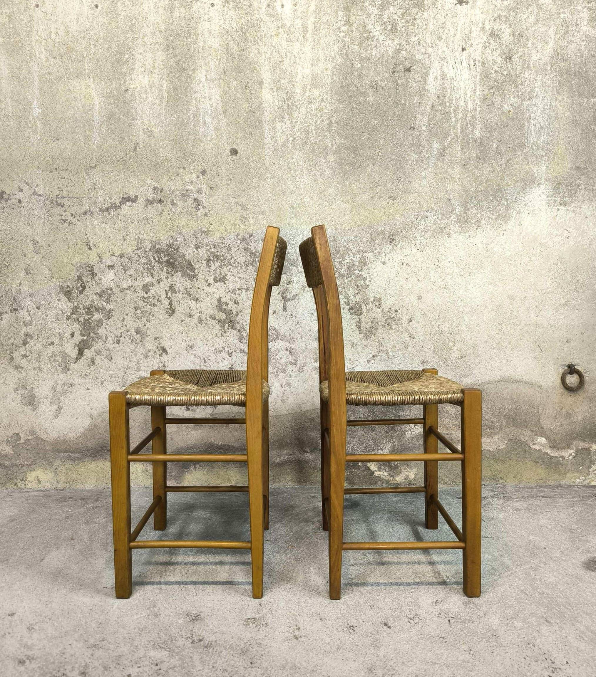 Pair of vintage wood and straw chairs