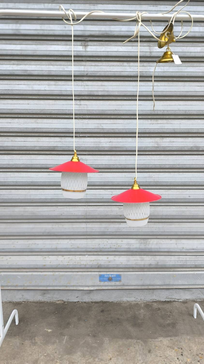 Pair of enamelled sheet metal and glass pendant lights