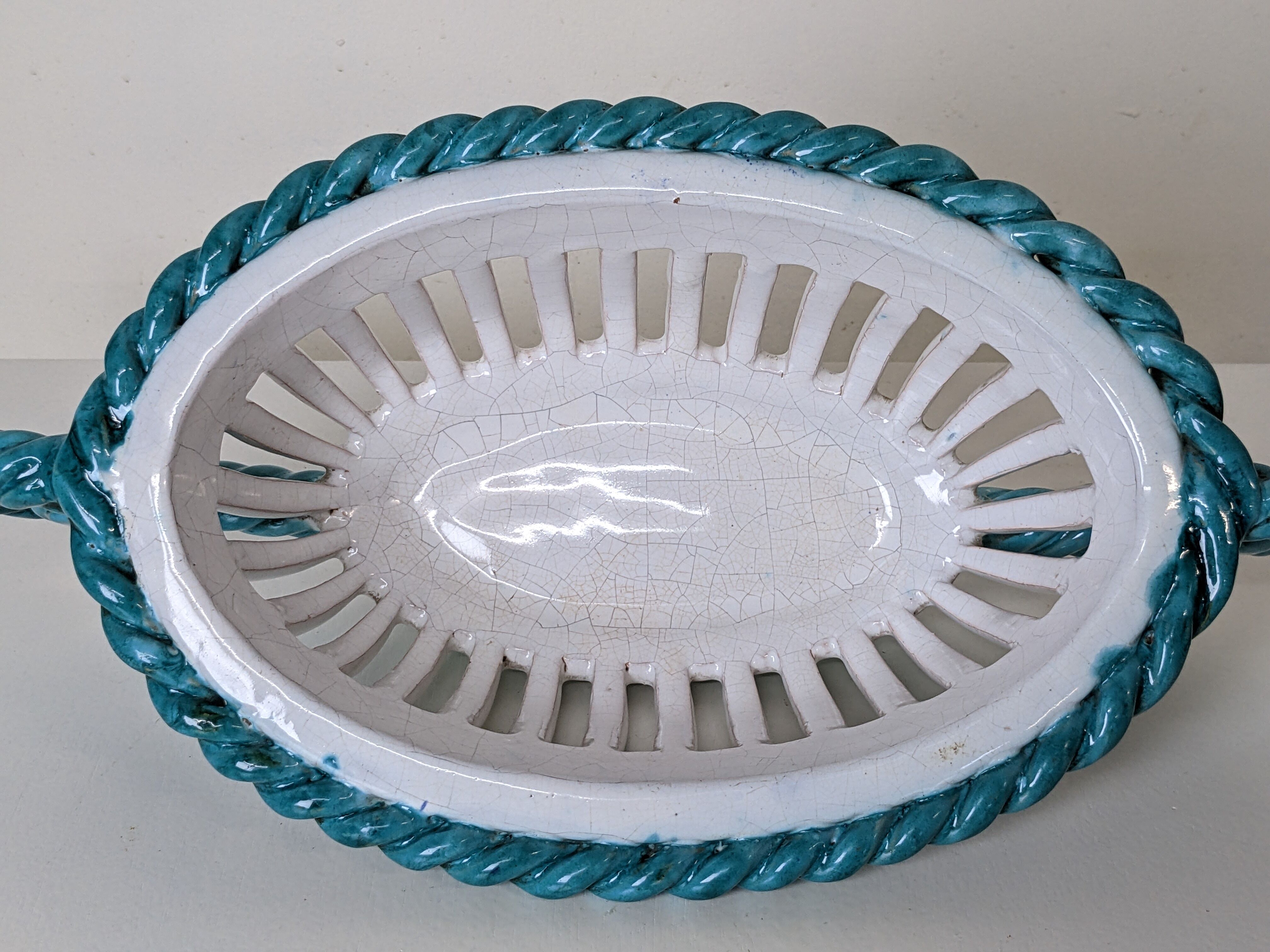 Set of 2 twisted earthenware fruit baskets by Sainte Radegonde, 50s