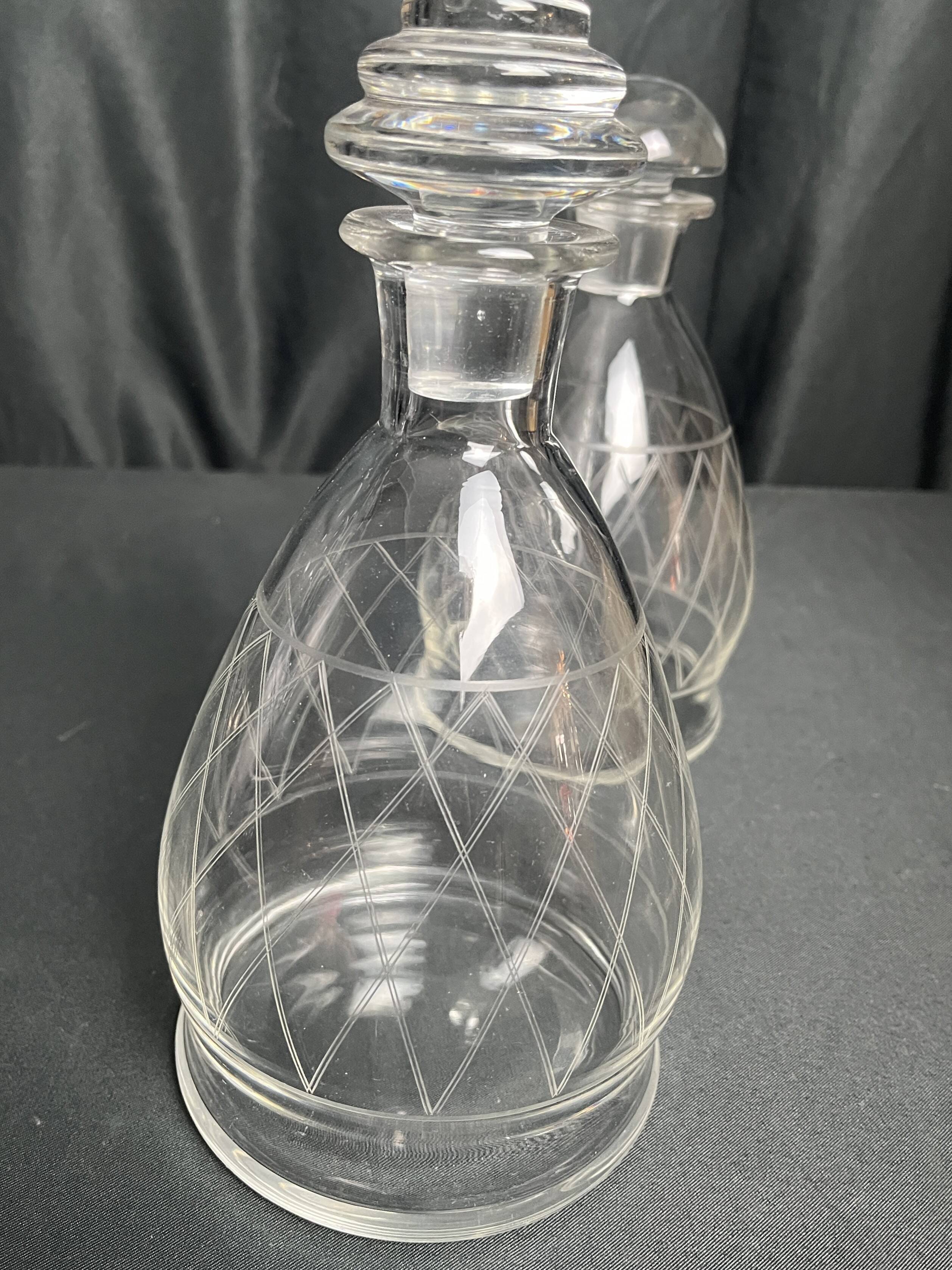 Tableware, two engraved crystal carafes with stoppers from around 1940.