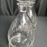 Tableware, two engraved crystal carafes with stoppers from around 1940.