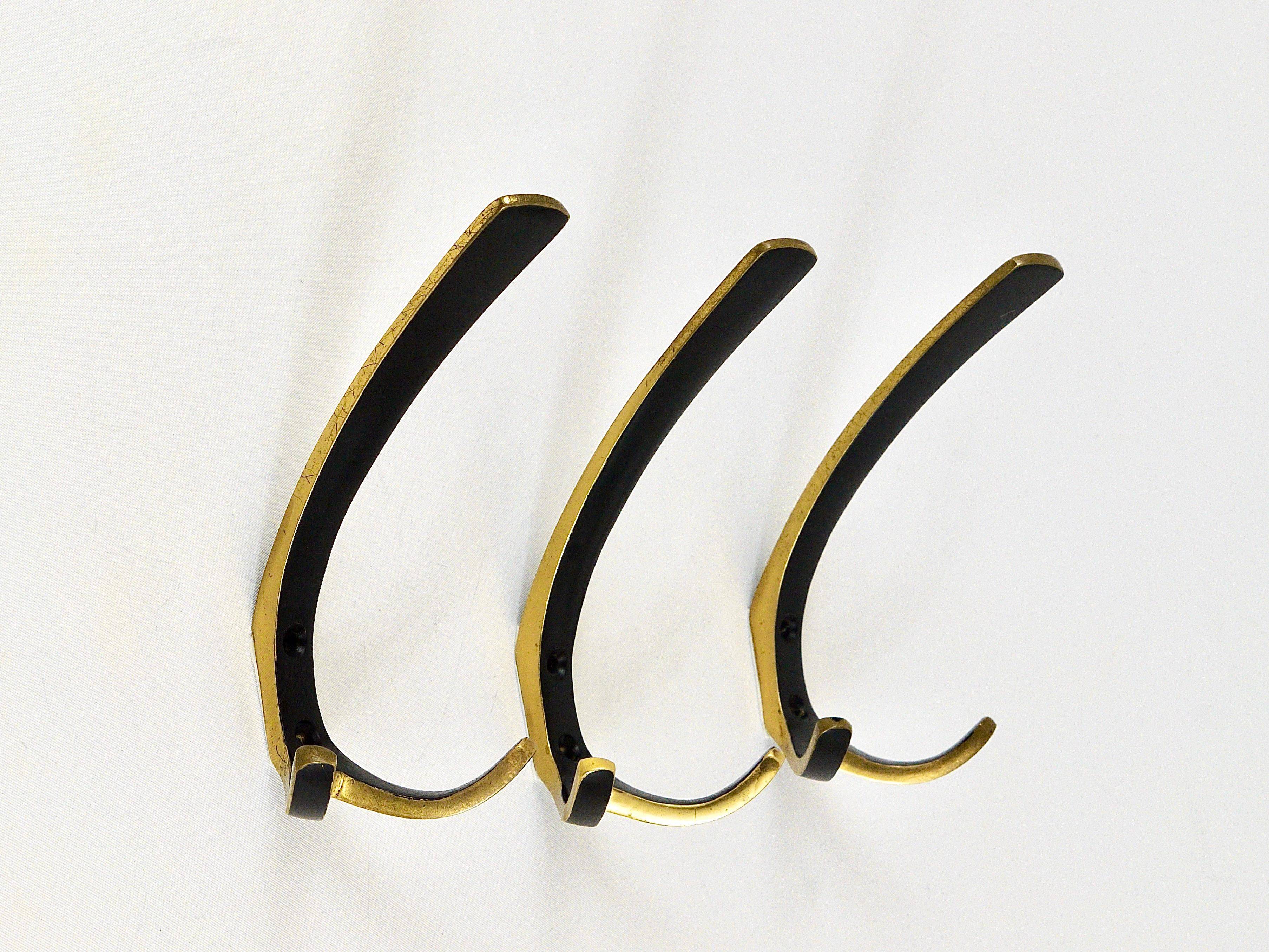 Up to 2 double wall hooks in brass from the mid-century by Herta Baller, Austria, 1950s.
