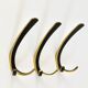 Up to 2 double wall hooks in brass from the mid-century by Herta Baller, Austria, 1950s.