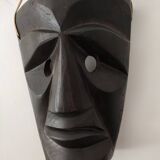 ethnic ebony mask to be laid or hung
