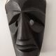 Ethnic ebony wood mask for display or hanging.