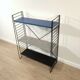 Mid century free standing rack with metal shelves by A. Dekker for Tomado
