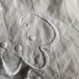 Monogrammed and embroidered castle sheet.