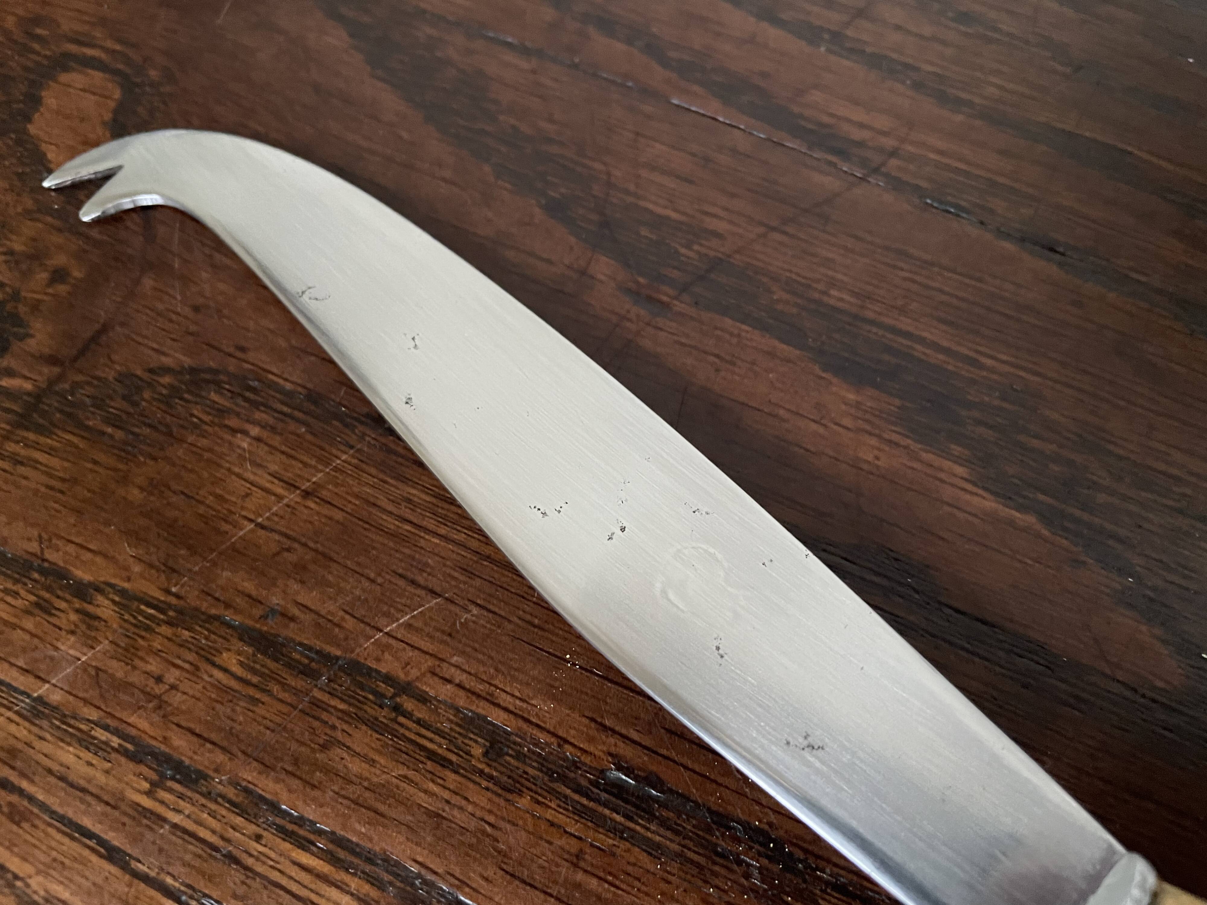 Bamboo handle cheese knife