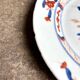 Compagnie des Indes porcelain flat plate with hand-painted Imari decoration, 18th century, no. 2