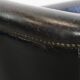 Black grained cowhide leather armchair