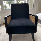 Fauteuil en velours noir et cannage