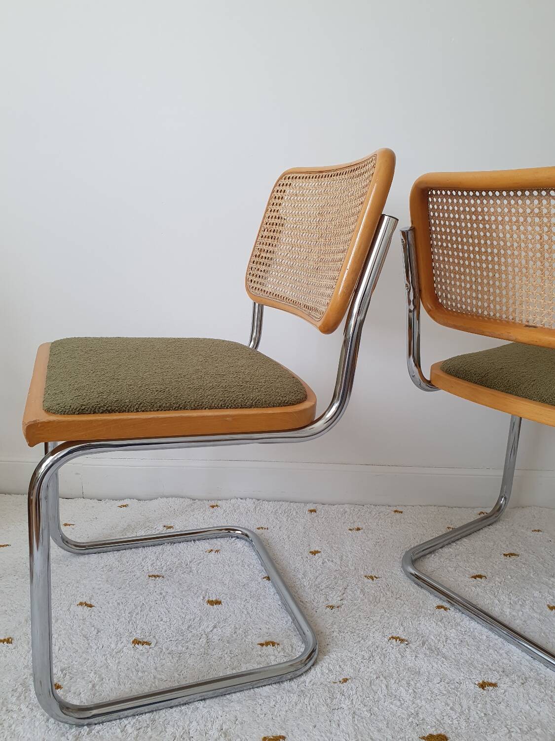 Pair of Marcel Breuer cane and fabric chairs