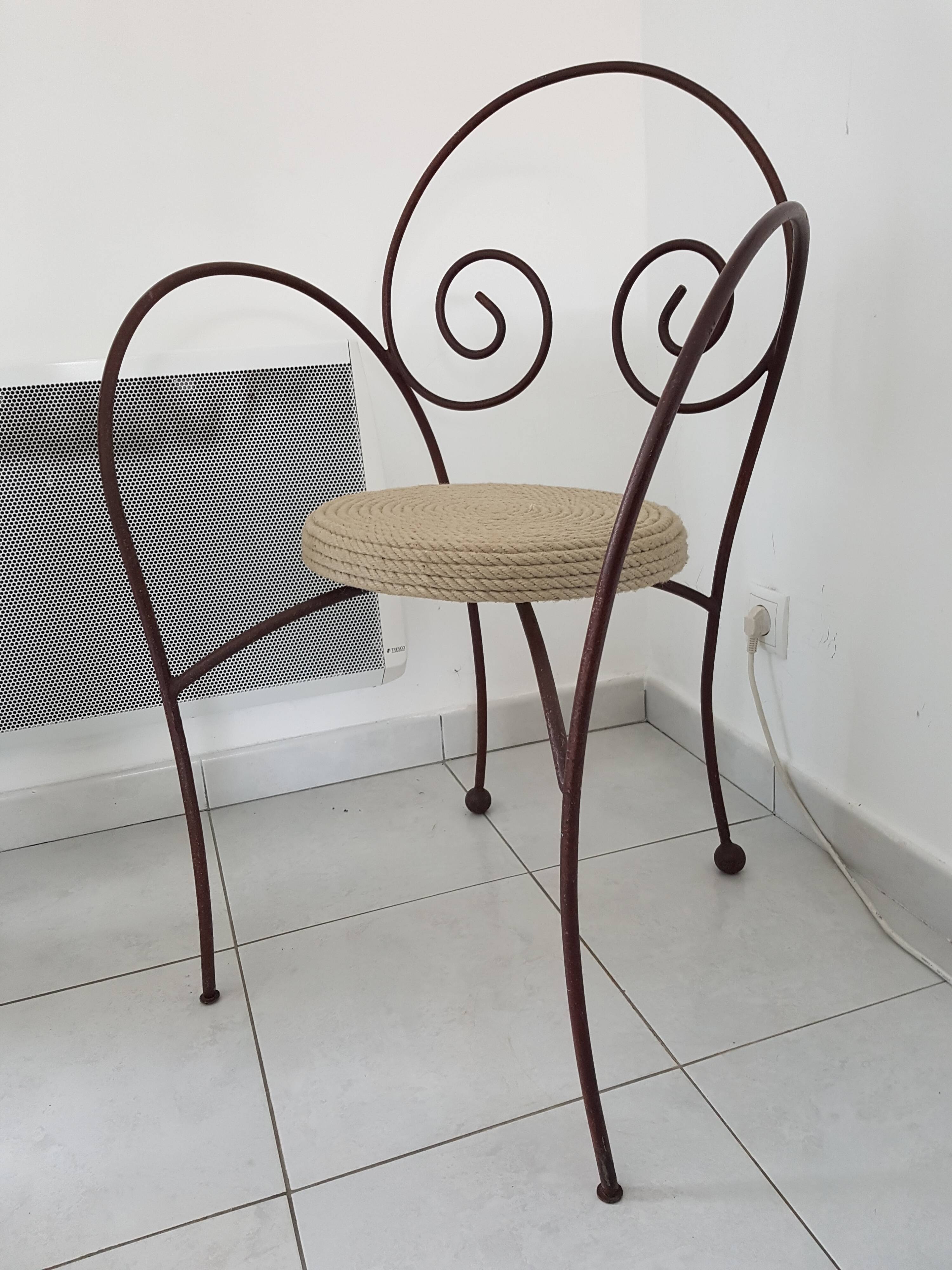 Wrought iron and rope chair