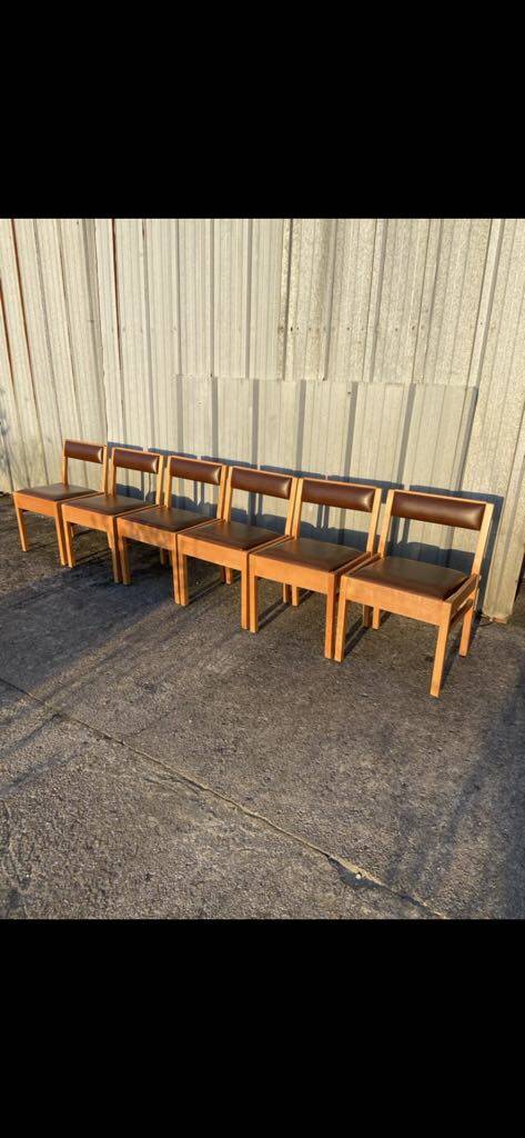 6 wooden chairs and faux leather
