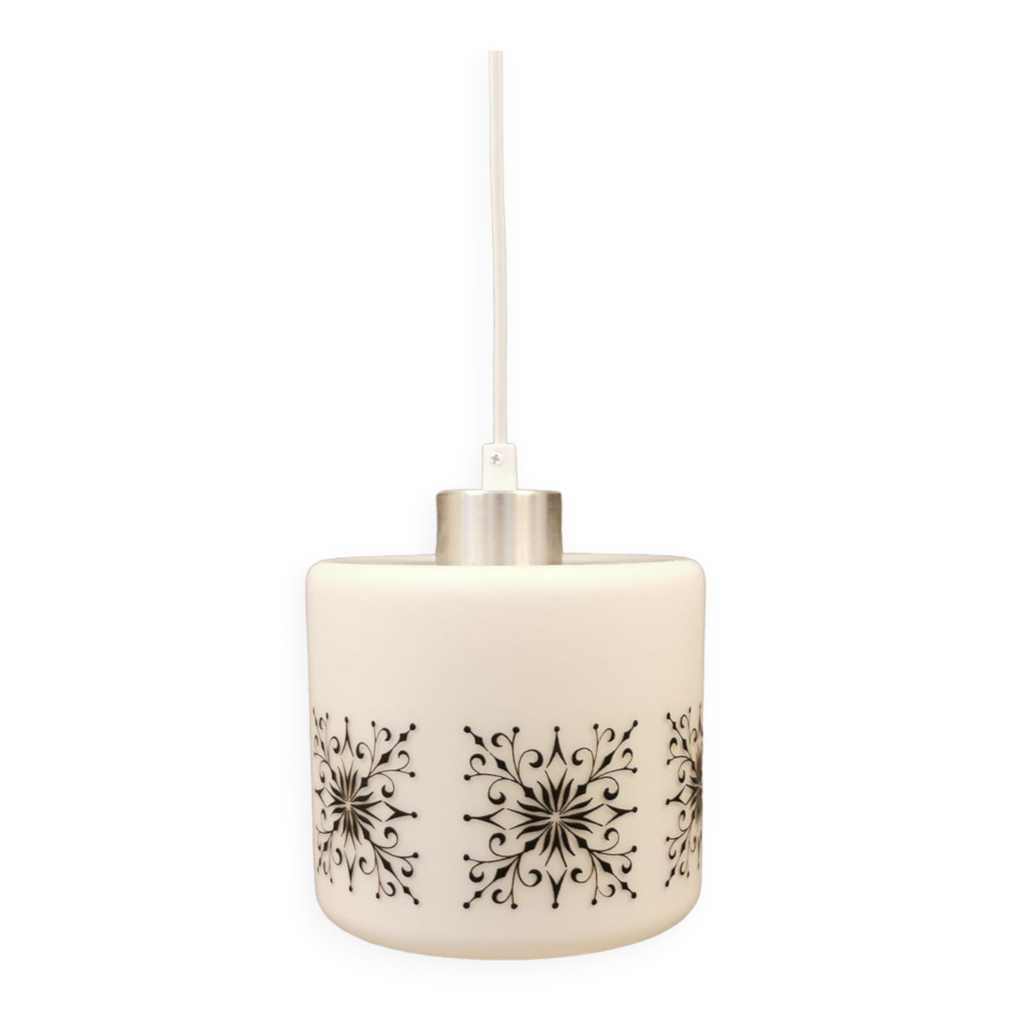 Scandinavian hanging lamp in white glass with inlayed black motifs.