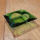 Green glass ashtray
