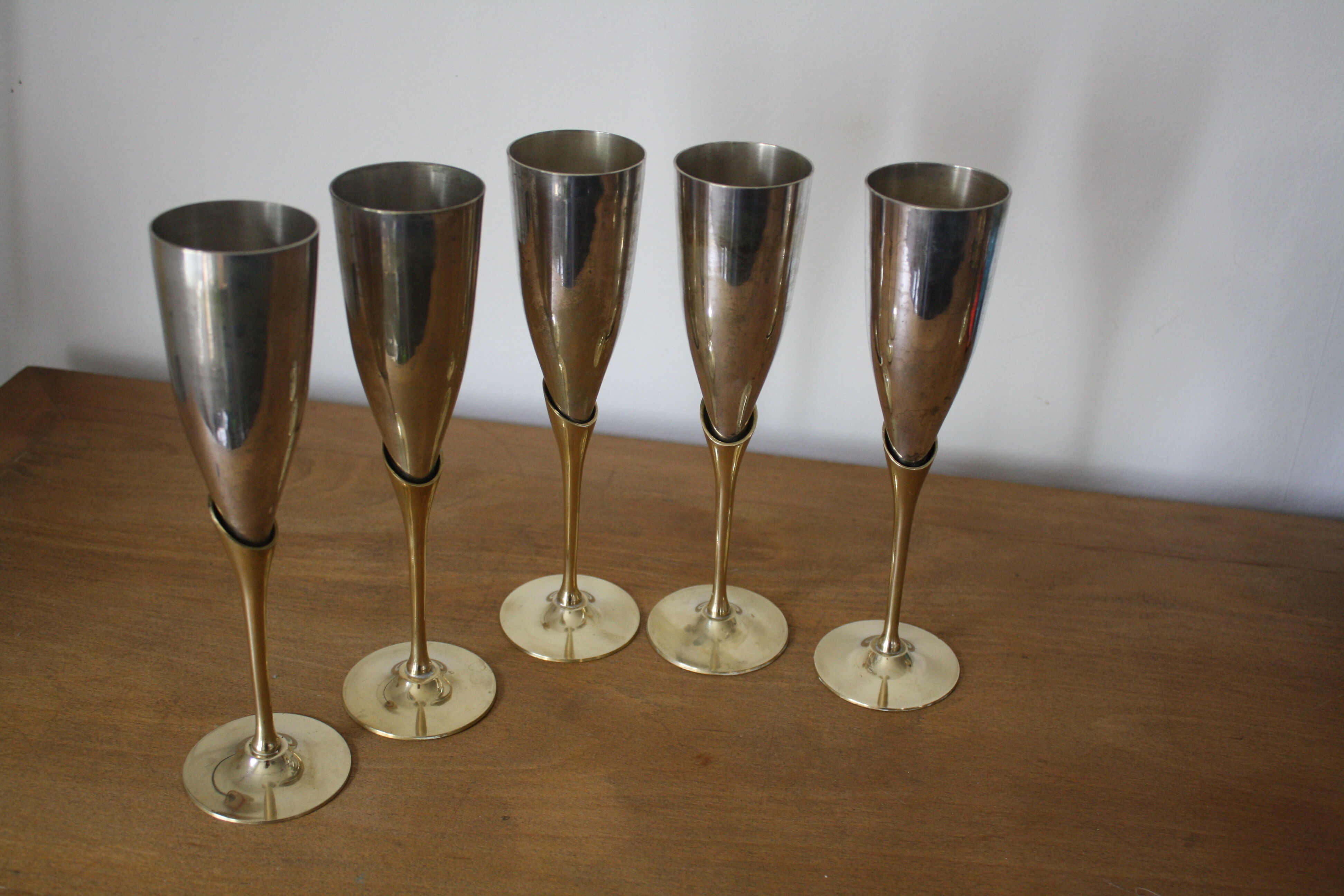 5 metal and brass champagne flutes