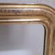 Golden Louis Philippe mirror H122xW84cm with gilded motifs.