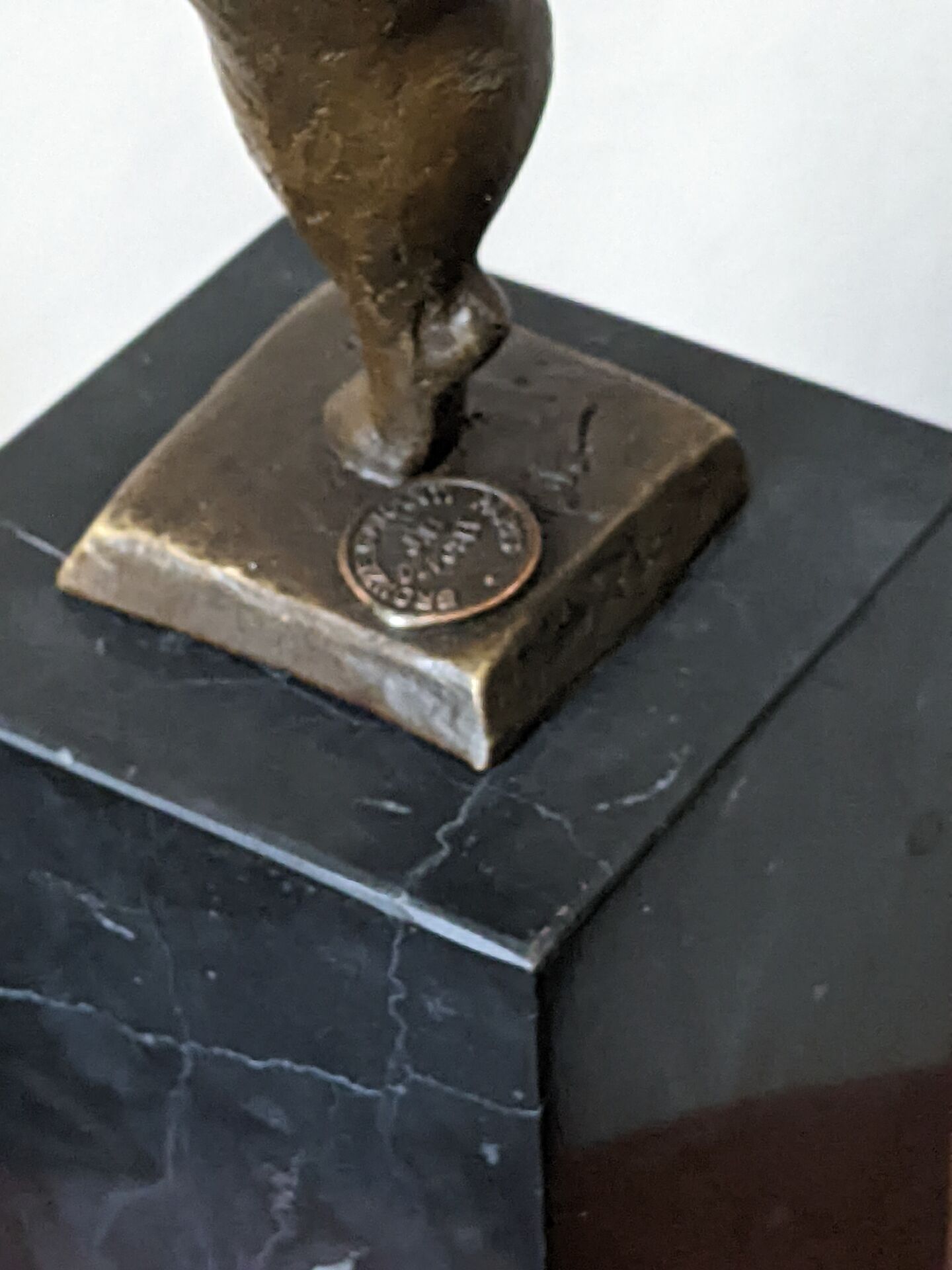 Contemporary sculpture on a marble base
