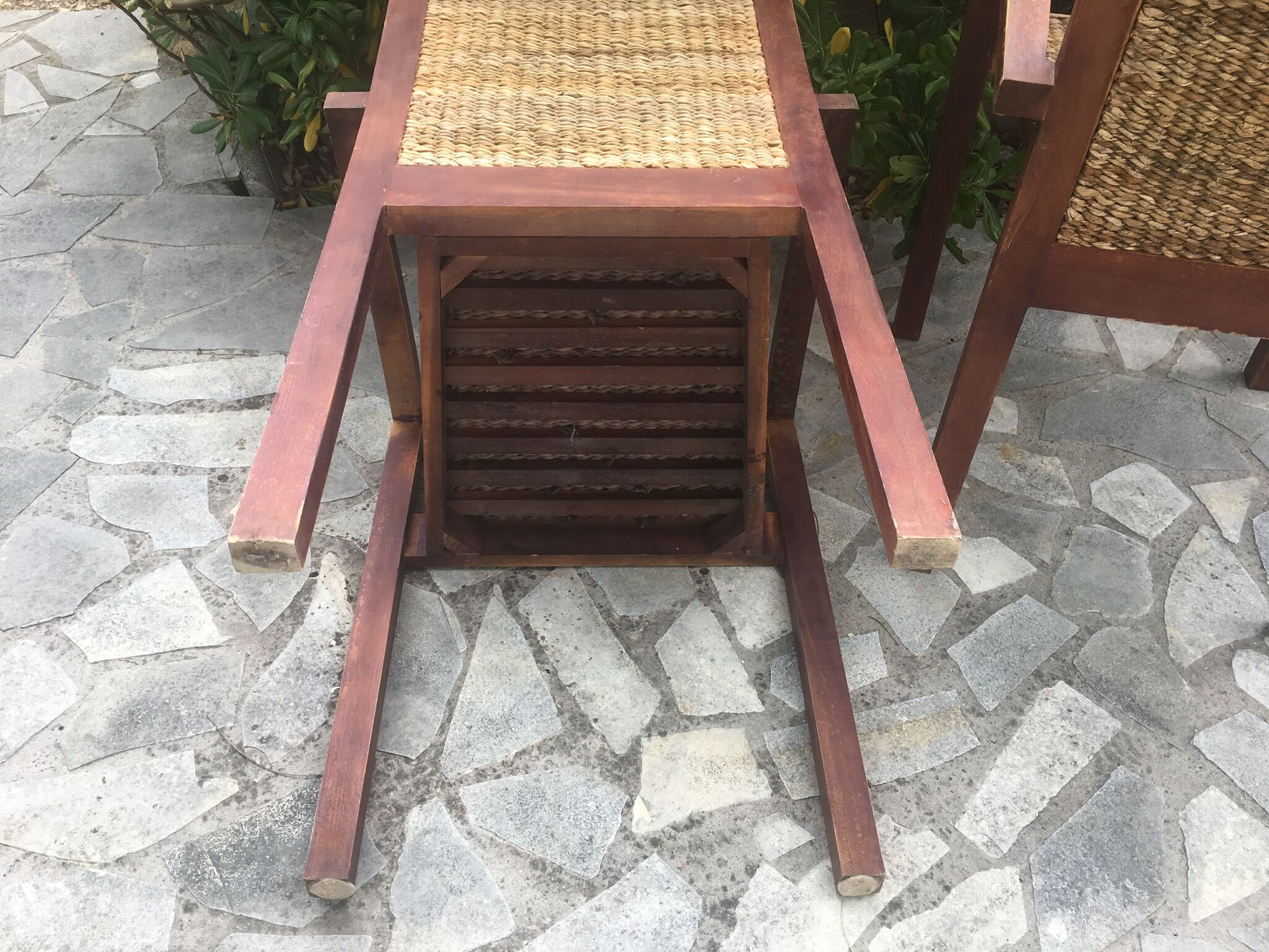 Pair of teak armchairs and braided wicker