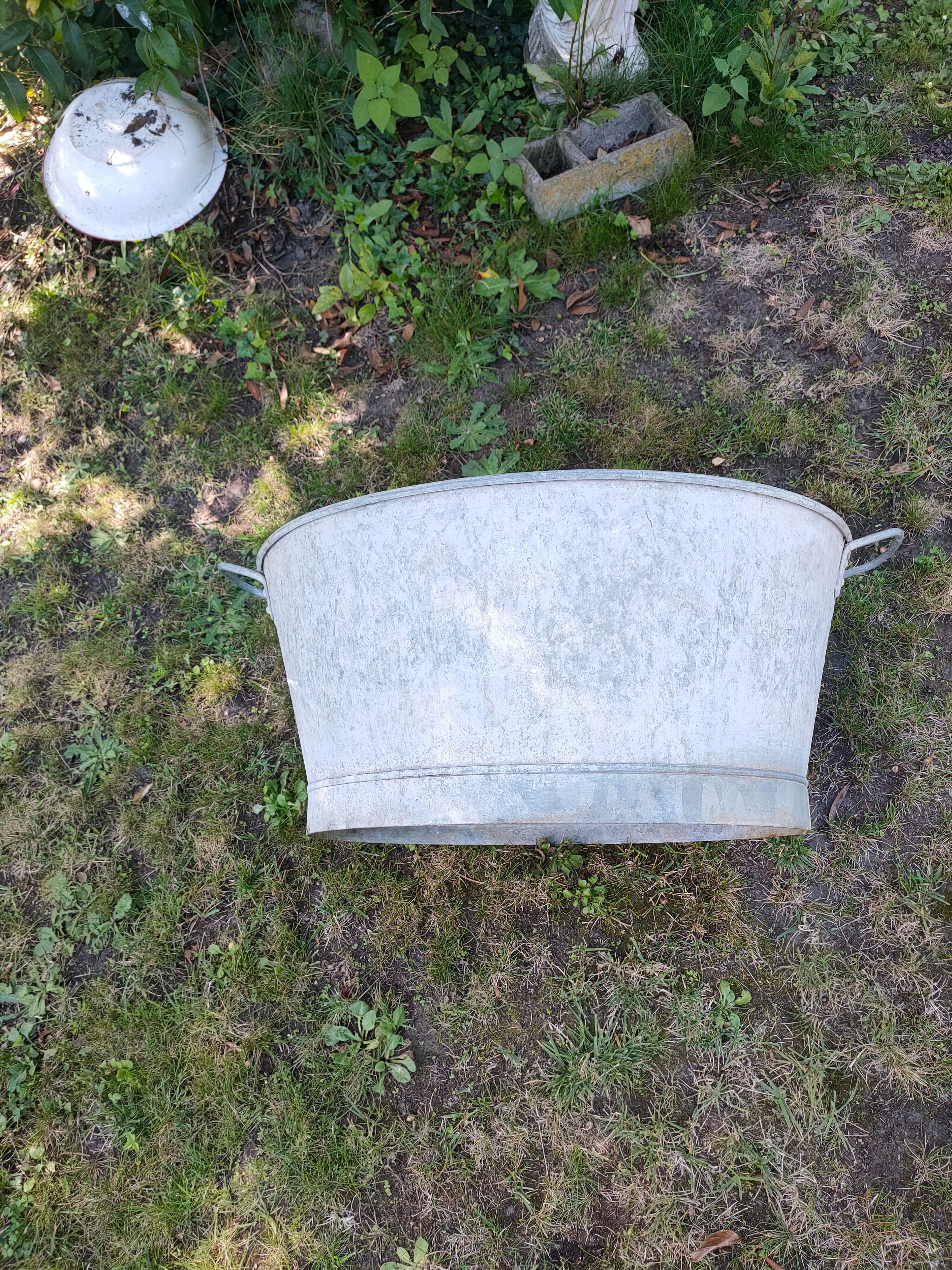 Old oval zinc basin