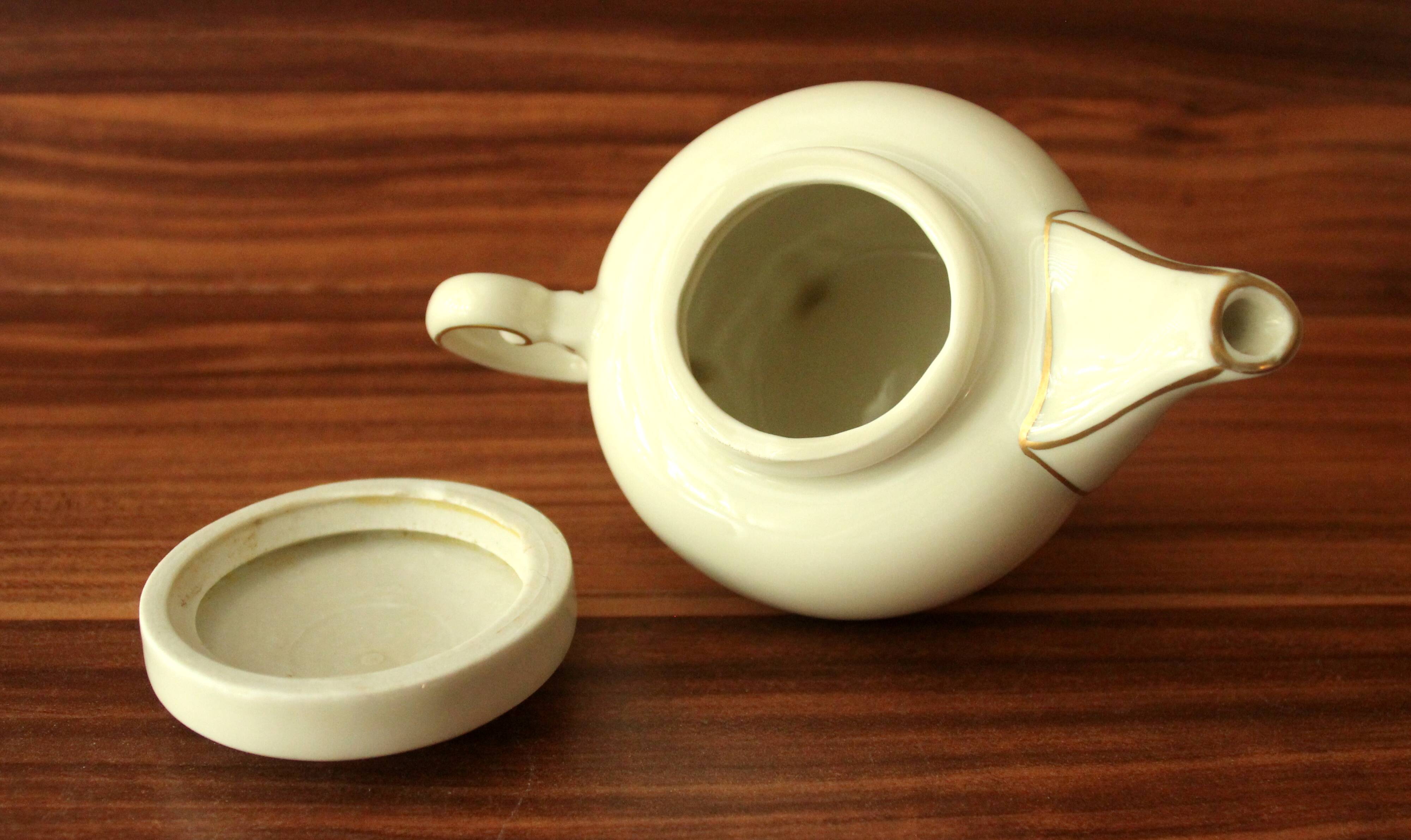 Small 1 portion porcelain teapot by Gerold/Bavaria - ivory white and gold