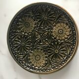 Small decorative chiseled ceramic plate