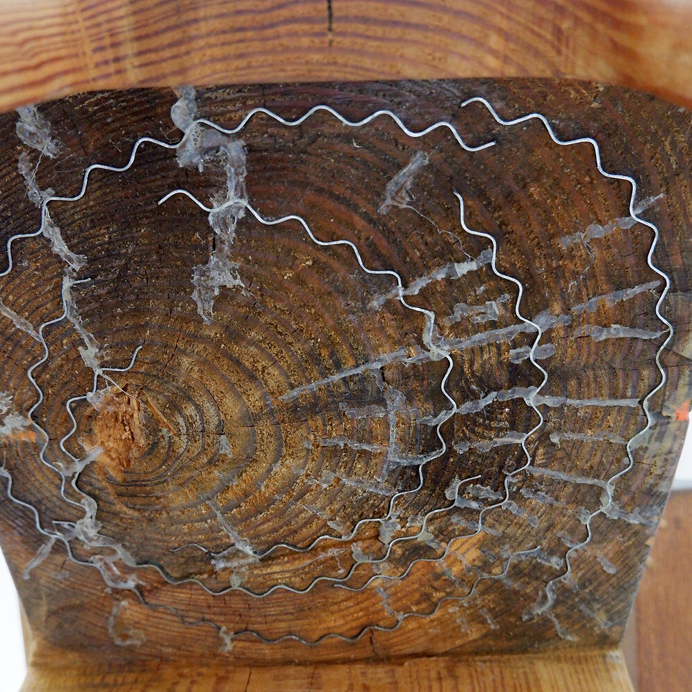 Sculptural high chair in brutalist style made of solid oak.
