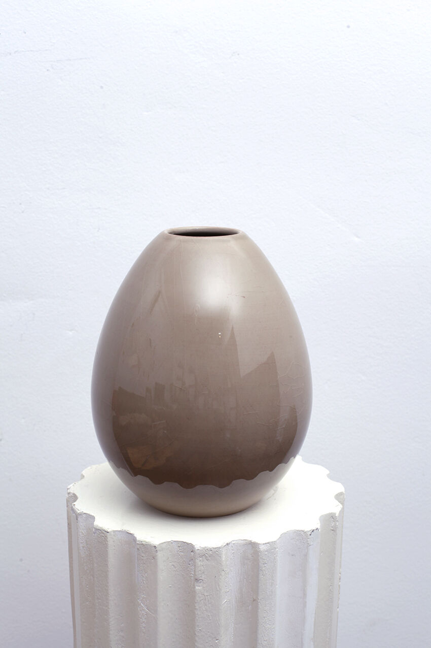 Beige ceramic vase egg shape