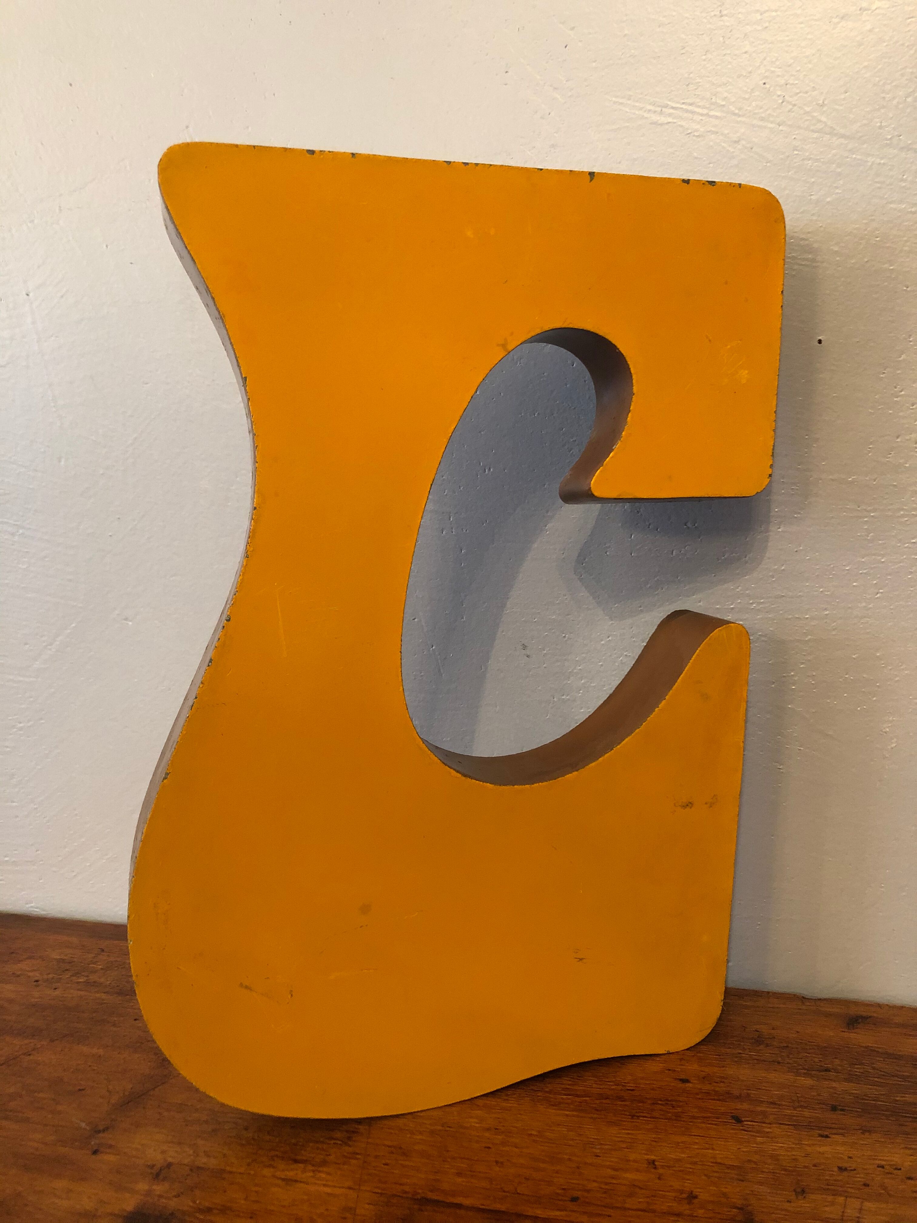 Metal letter c 70s