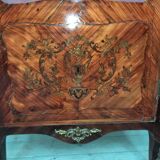 Louis xv showcase with a marble door