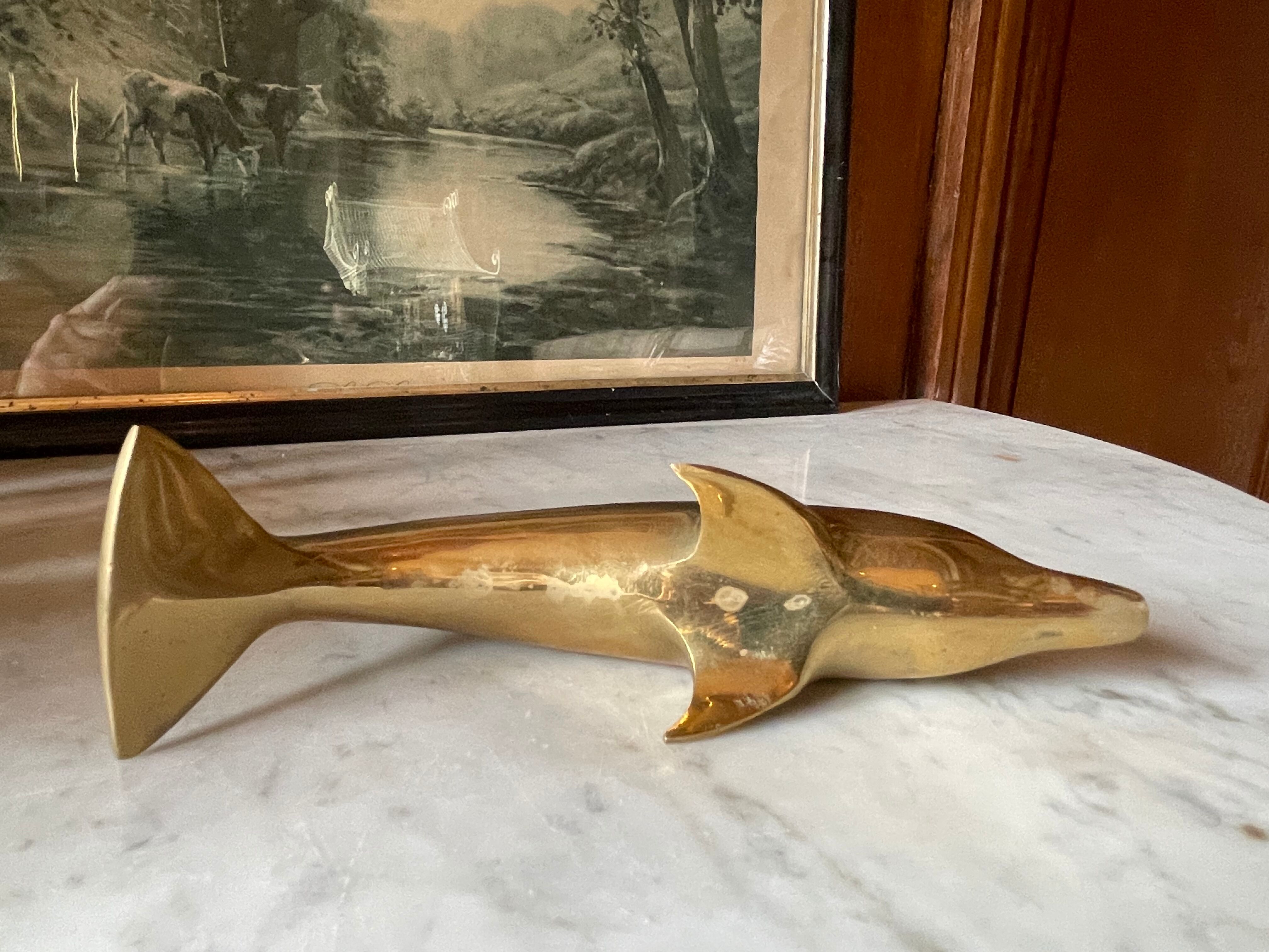 Vintage brass dolphin
