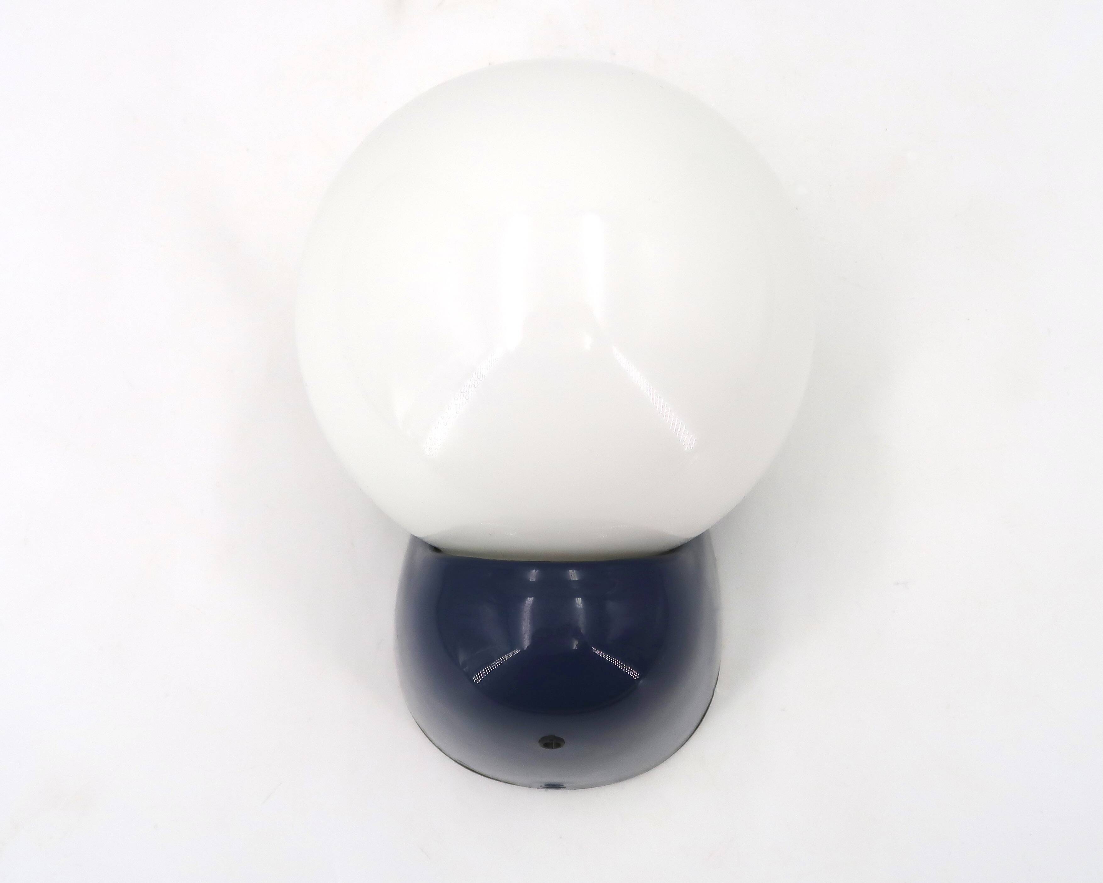 Tissot wall light in dark blue with a white opaque glass globe