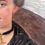 Old oil painting on canvas portrait of a woman in traditional costume