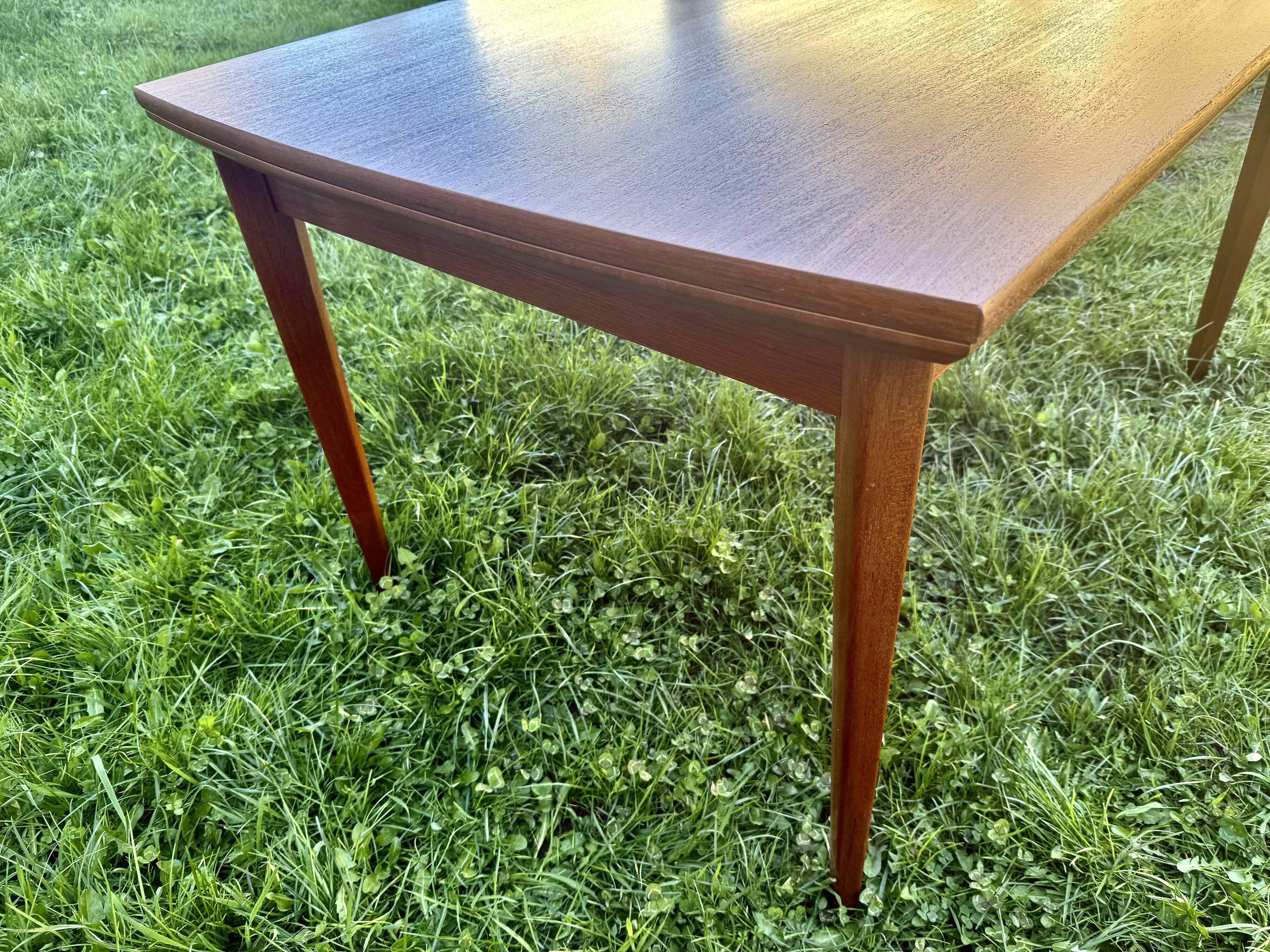 Scandinavian extendable teak dining table