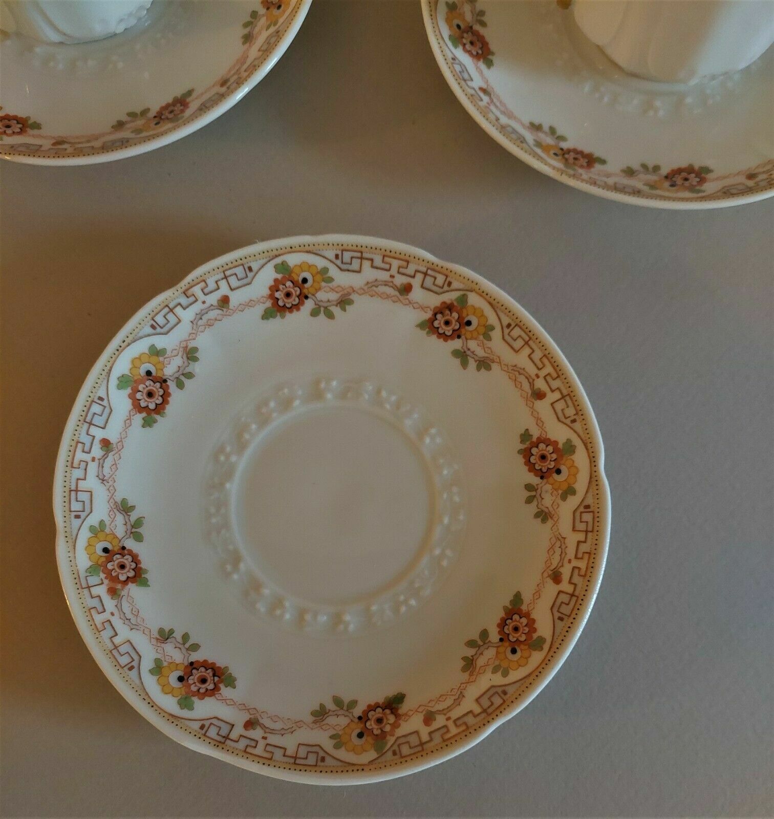 Porcelain cups UC Limoges, series of three