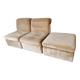 Pair of modular velvet armchairs and ottoman
