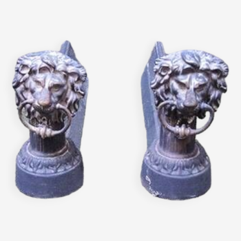 Old lion's head cast iron andirons