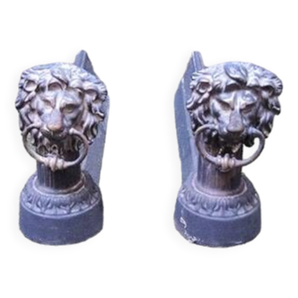 Old lion's head cast iron andirons