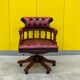 Chesterfield Revolving Captain's Chair with Red Leather Upholstery