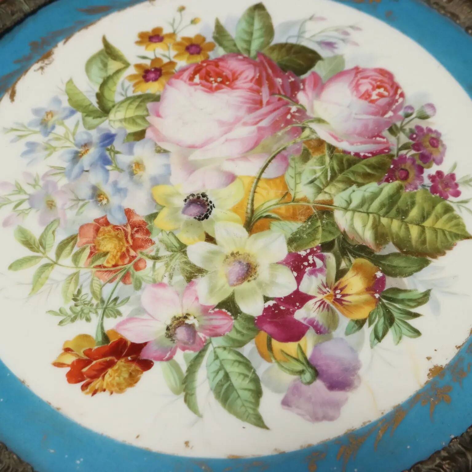 Antique walnut coffee table with painted ceramic insert, 20th century.