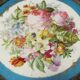 Antique walnut coffee table with painted ceramic insert, 20th century.