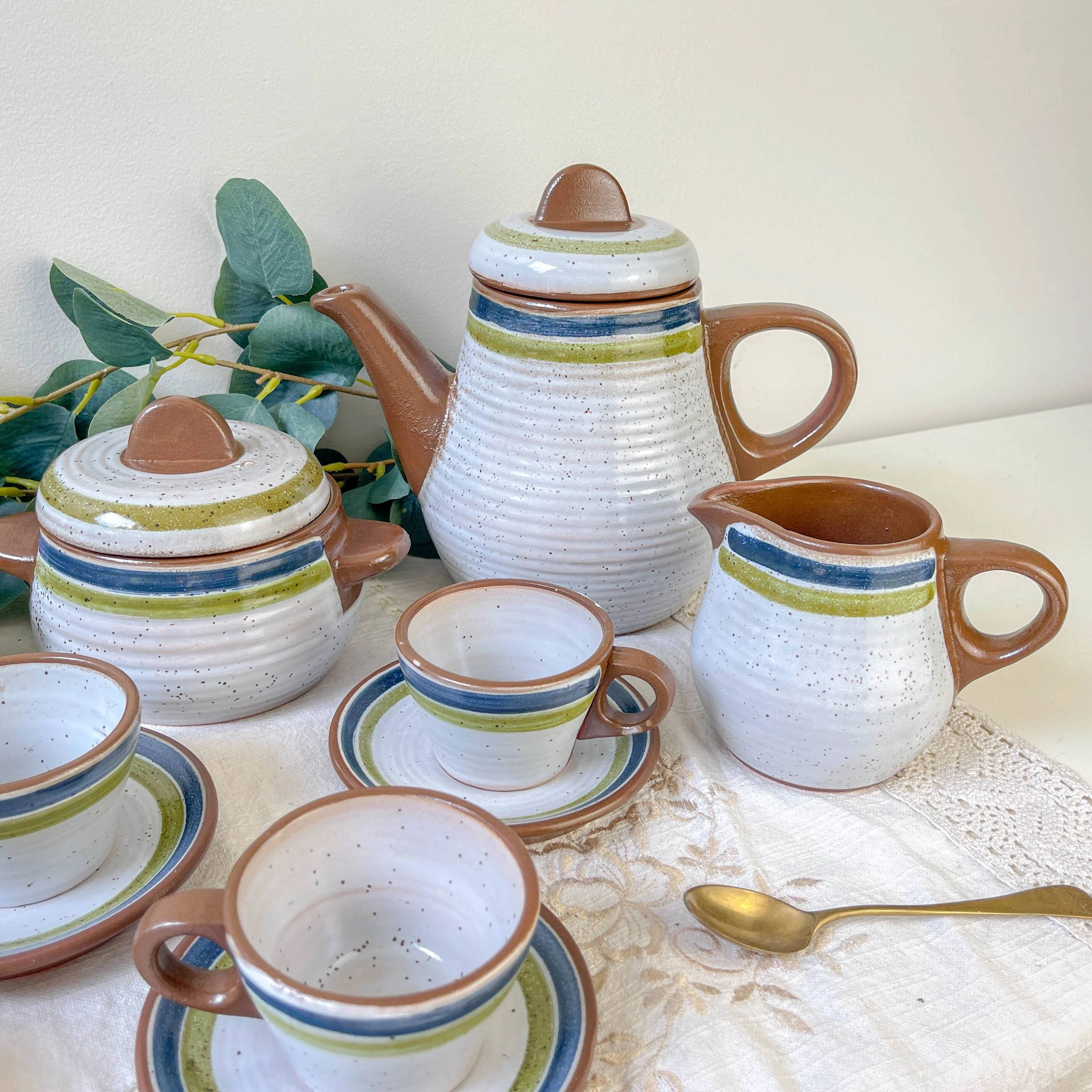 Vintage 1950s speckled stoneware coffee set with grey, green, and blue stripes