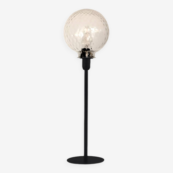 Table lamp with an old embossed glass globe