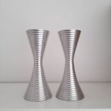 Pair of fluted aluminum candlesticks