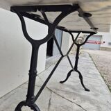 Antique marble and cast iron bistro restaurant table