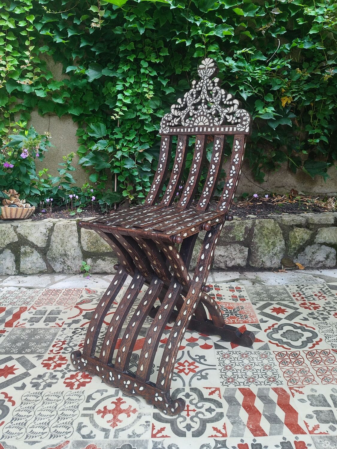 Antique folding oriental chair with mother-of-pearl inlays